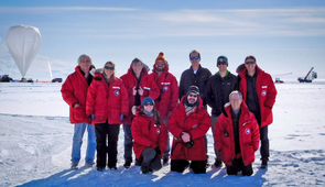 Chris Walker (left) and his STO team on launch day. The balloon can be seen on the left, with the STO payload hanging from a crane truck on the right. (Credit: NASA/NSF) Chris Walker (left) and his STO team on launch day. The balloon can be seen on the left, with the STO payload hanging from a crane truck on the right. (Credit: NASA/NSF)